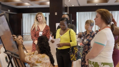 people working together in a conference session